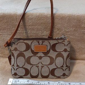 Coach Signature logo wristlet